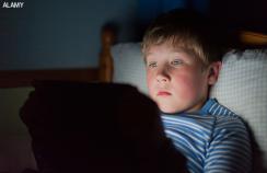 A young boy on a tablet