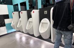 Man in a urinal